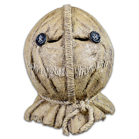 Trick ’r Treat Sam Burlap Mask featuring sculpted burlap texture, button eyes, and signature sinister smile 