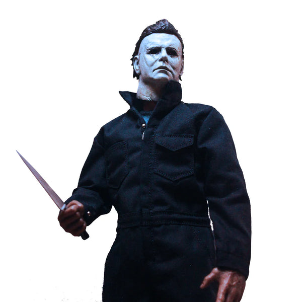 Halloween 2018 Michael Myers 12-inch action figure horror collectible in navy blue coveralls and wearing white mask and gripping knife close up view