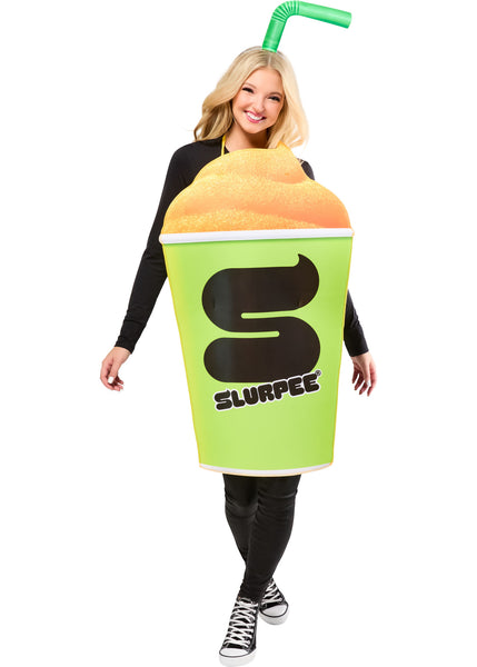 Woman posing in the Adults 7-11 Slurpee Drink Cup Costume Featuring a foam-backed tunic costume shaped like a 7-11 Slurpee cup, designed with a bright green exterior, a large printed black S logo and SLURPEE text on the front, a dimensional orange frozen drink top, an attached green straw headpiece, and yellow tie straps at the neck and waist to secure the costume comfortably over clothing.