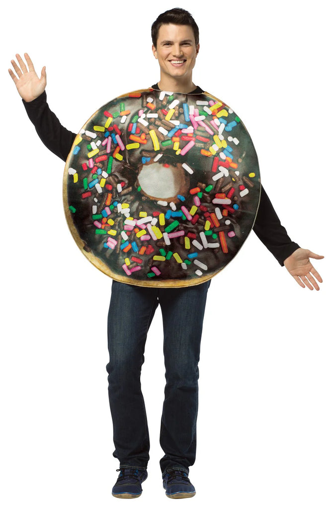 Man posing in the Adults Chocolate Donut with Sprinkles Costume Featuring a round foam tunic designed to resemble a chocolate-frosted donut with a center cutout, printed with a glossy chocolate icing effect and topped with multicolored sprinkle graphics across the front, paired with a smooth black back panel