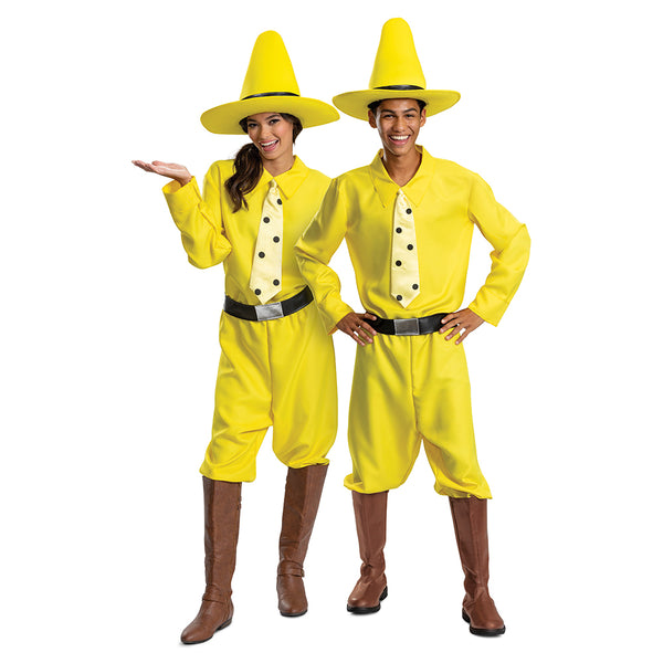 Man and woman in the Adults Curious George Person In The Yellow Hat Costume featuring a bright yellow long‑sleeve shirt styled with a pointed collar and a clip-on tie printed with bold black polka dots for a clean, character‑accurate look. The costume includes matching yellow pants with a relaxed fit, a wide black belt, and a tall structured yellow hat with a wide brim and black band that completes the instantly recognizable silhouette.