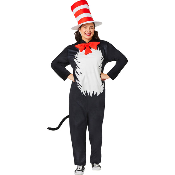 Woman posing in the Adults Dr. Seuss Cat in the Hat Costume Featuring a full-length black jumpsuit with an attached white chest panel shaped like fur, paired with a detachable black tail, a large red bow tie accessory at the neckline, and a tall red and white striped hat with a wide white brim.