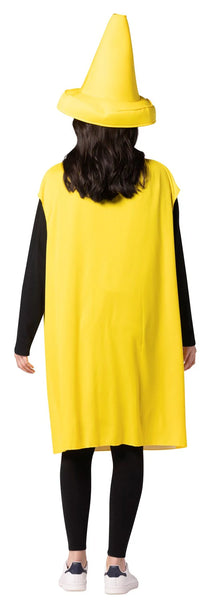 Back view of woman in Adults Mustard Bottle Costume Featuring a bright yellow bottle-shaped tunic with a smooth fabric finish and a wide, sleeveless cut that drapes over the body to mid-thigh length. The front displays bold black lettering spelling mustard, and the costume is paired with a matching oversized hat designed to resemble a pointed squeeze-bottle cap with a circular base brim. 