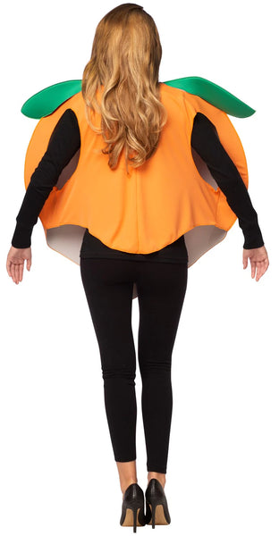 Back view of woman posing in the Adults Pleasant Peach Costume Featuring a large orange poly-foam tunic shaped like a rounded peach with a smooth surface, subtle center seam detail, and two attached green leaf accents at the neckline, designed in a loose, wearable silhouette that slips on easily over clothing.
