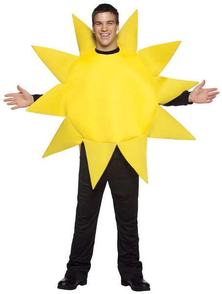 Man in the Adults Sunny Day Giant Yellow Sun Costume Featuring a bright yellow polyfoam tunic designed in a circular sun shape with a smooth fabric surface and dimensional structure. The costume includes multiple pointed rays extending outward around the perimeter, along with a central round panel and side openings for arms. 