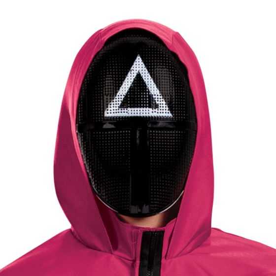 Person wearing a pink hooded jacket with a black mask featuring a white triangle symbol 
