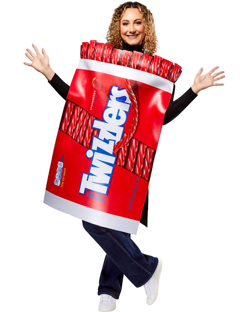 Woman in the Adults Twizzlers Candy Costume Featuring a foam-backed tunic costume styled to resemble a Twizzlers candy package, with a bold red wrapper design, oversized white Twizzlers logo centered across the front, printed strawberry flavor labeling, realistic red licorice twists detail along the top edge, white band accents at the top and bottom to mimic packaging, and an easy slip-on, sleeveless construction with side ties for an adjustable fit.