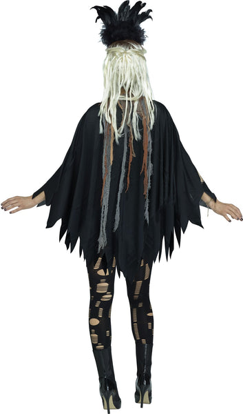 Back of a woman wearing the Adults Voodoo Witch Doctor costume poncho featuring a loose, draped black poncho-style top designed with jagged, uneven edges for a distressed silhouette; printed with a bone and skeleton-inspired graphic down the front and accented with layered strips of tattered fabric in gray and brown tones that hang vertically for added texture and movement. The neckline is styled with rope ties and distressed burlap-like detailing, enhancing the overall rugged, ritual-inspired look