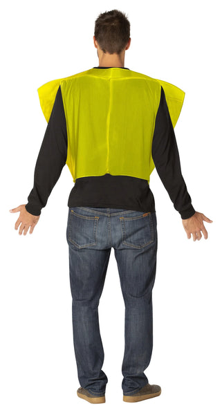 Back view of Man in the Adults Slice of Cheese Costume Featuring a yellow poly-foam tunic shaped like a triangular slice of cheese, designed with a wide top and tapered point at the bottom, detailed with multiple circular hole graphics across the front surface, and a lightweight slip-on construction that fits over the head with open sides for arms and a smooth yellow back panel.
