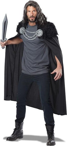 Man posing in the Black Medieval Viking Wolf Clan Warrior Cape Costume Accessory Featuring a long black cape made from smooth, flowing fabric with a full-length drape, accented by a plush black fur-style shoulder yoke, secured at the front with two large round silver medallion clasps connected by a decorative chain detail for a bold, layered warrior finish.