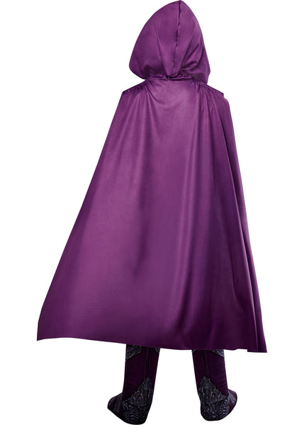 Back of child in the Boys Deluxe Masters Of The Universe Skeletor Costume Featuring a full costume set including a blue jumpsuit with printed muscle shading throughout the chest, arms, and legs, a molded chest armor piece with intricate dark detailing and a red gem centerpiece, a matching belt with sculpted accents, attached boot tops, long wrist gauntlets, a flowing purple hooded cape, and a full-face skull mask with defined teeth and hollow eye details.