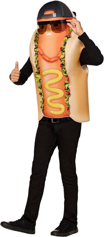 Child giving a thumbs up in the Boys Fortnite The Brat Hotdog Costume Featuring a full overhead foam-supported tunic designed to resemble The Brat from Fortnite, with printed hot dog and bun details, relish accents along the front edges, a yellow mustard swirl graphic, and printed sausage-link necklace artwork near the neckline. The costume also includes plastic sunglasses with a Velcro attachment