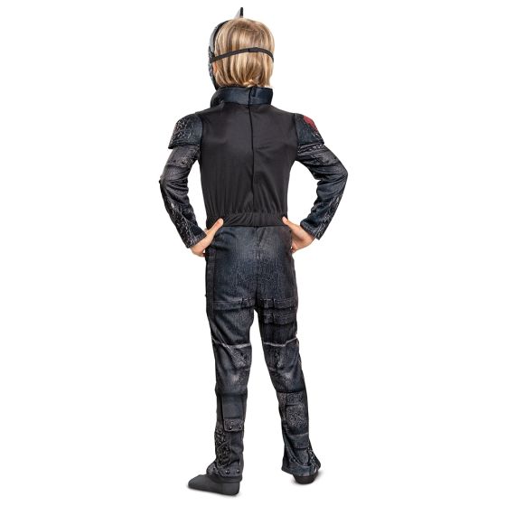 Back of boy wearing the Boys How to Train Your Dragon Hiccup Costume Featuring a full-length jumpsuit designed to represent Hiccup, this costume includes black armor-style panel printing with textured detailing across the chest, shoulders, arms, and legs to mimic scaled and plated surfaces. The outfit features an attached waist design without a separate belt piece, and a molded character mask with sculpted dragon-inspired contours, a central ridge, and narrow eye openings with colored accents.