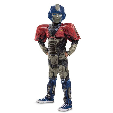 Boys Transformers One Optimus Prime Orion Pax Muscle Costume features a full‑body jumpsuit designed with detailed printed armor graphics in red, blue, gray, and metallic tones, creating a futuristic robotic appearance from head to toe. The suit includes built‑in padded muscle detailing across the chest and arms, along with structured shoulder pieces; and a molded character mask styled as Optimus Prime’s Orion Pax face, featuring a blue helmet design, silver faceplate, and bright blue eyes