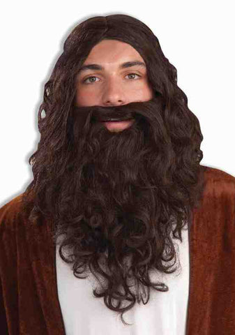 Man modeling the Brown Biblical Wig and Beard Costume Accessory Set which features  a long, dark‑brown synthetic wig styled with loose, natural‑looking curls that extend past the shoulders, paired with a full, flowing brown beard designed with layered curls for added depth and realism; the beard is shaped to cover the chin and jawline completely while blending seamlessly with the wig to create a cohesive, traditional biblical silhouette