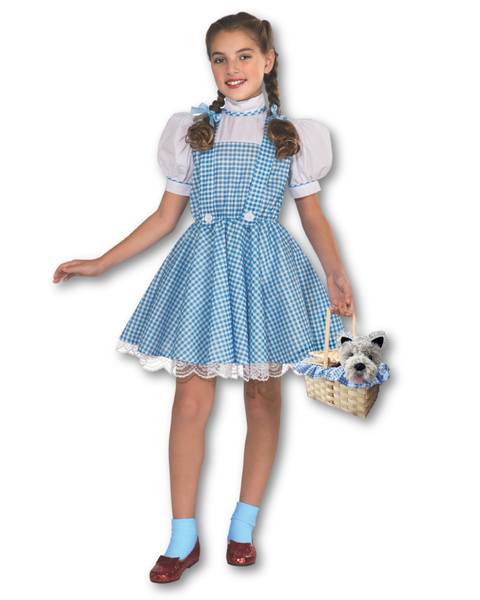 A young girl modeling a Dorothy costume while holding a small woven basket with a plush dog inside