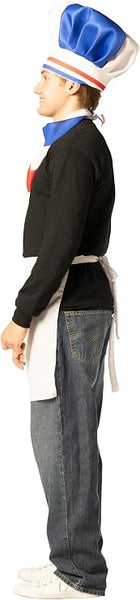 Side view of Man in French Chef Hat, Scarf & Apron Costume Accessory Kit Featuring a tall chef hat with a gathered top in red, white, and blue color blocking, accented by a striped band around the base, paired with a matching neck scarf in coordinating red, white, and blue panels. The set also includes a white waist apron with a wraparound tie closure