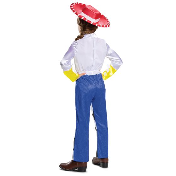 Back of Girls Disney Pixar Toy Story Cowgirl Jessie Costume Featuring a one-piece jumpsuit designed with a white top and bright yellow sleeve cuffs, this costume includes printed button details and a wide brown belt graphic with a gold buckle at the waist. The attached pants feature a blue upper section that transitions into a white base with black cow-print panels and flared leg openings, paired with a red wide-brim hat accented with white stitching detail around the edge.