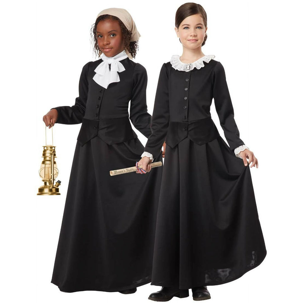 Two girls in the Girls Susan B. Anthony or Harriet Tubman Costume Featuring a long black full-length dress with a fitted bodice, button front detail, and gently flared skirt, designed with interchangeable accessories including a delicate white lace collar, a ruffled collar option, removable lace cuffs, a fabric hair wrap, and a cameo-style pin for customizable styling.