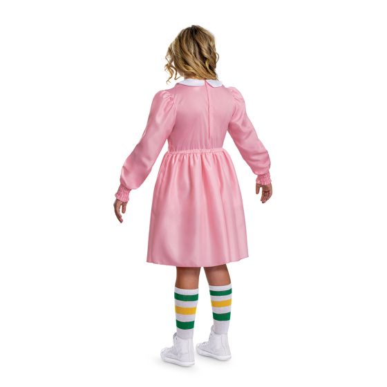 Back of Girl in the Girls/Teens Stranger Things Eleven Pink Costume Dress Featuring a pink long-sleeve dress with a smooth satin-like finish, this costume includes a gathered bodice with smocked detailing across the chest and elasticized cuffs at the wrists, along with a white collar at the neckline. The set also includes a pair of knee-high socks designed with green, yellow, and white horizontal stripes.