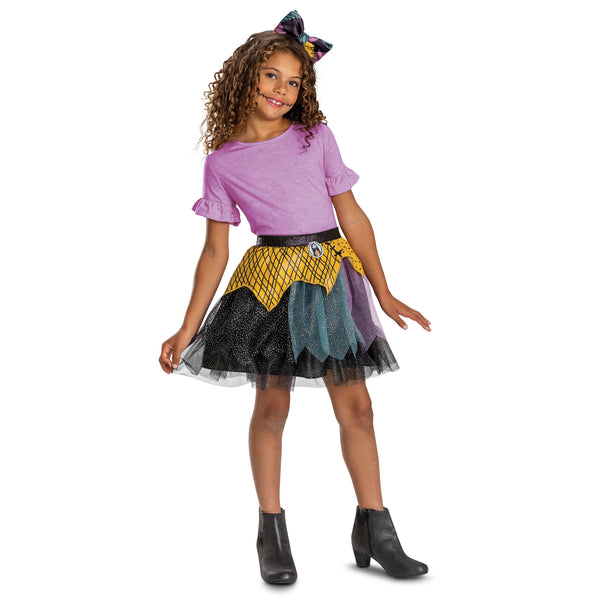 Girls The Nightmare Before Christmas Sally Tutu and Headband Costume Accessory Kit Features a two‑piece set inspired by Sally, including a layered tutu skirt and coordinating headband with bow detail. The skirt is designed with mixed‑color panels of black, teal, purple, and yellow mesh fabric, arranged in uneven, patchwork‑style layers with a light shimmer finish. The waistband is finished with a sparkled black band and a small Sally character cameo at the front. The headband includes a matching bow