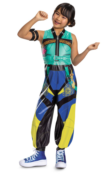 Girl posing in Girls K-Pop Demon Hunters Zoey Costume featuring one‑piece outfit designed with a teal sleeveless top and bold multicolor pants in black, blue, and neon yellow. The top includes a printed zipper detail down the front, gold geometric trim across the chest, and a matching belt design at the waist. The pants are styled with large graphic panels, decorative patterns, and contrasting sections that create a dynamic, performance‑ready look. The costume also includes a coordinating arm band accessory