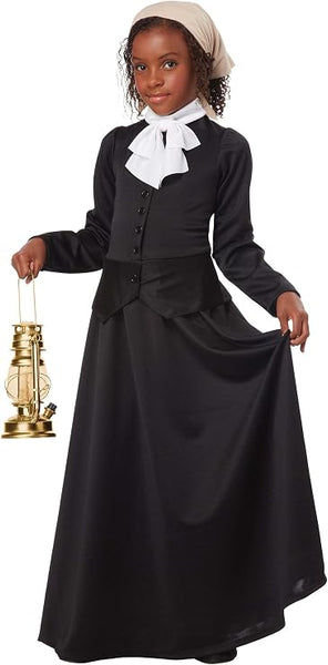 Girl in the in the Girls Harriet Tubman Costume Featuring a long black full-length dress with a fitted bodice, button front detail, and gently flared skirt, designed with interchangeable accessories including a delicate white lace collar, a ruffled collar option, removable lace cuffs, a fabric hair wrap, and a cameo-style pin for customizable styling.