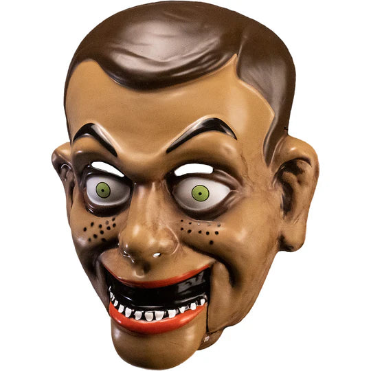 Goosebumps Night of the Living Dummy Slappy the Dummy Vacuform Costume Mask features a lightweight, vacuform mask with Slappy's instantly recognizable mischievous grin, arched eyebrows, sharp cheek contours, slicked brown hair, and bold painted details that recreate the vintage book-cover look of the infamous ventriloquist dummy, left side profile view