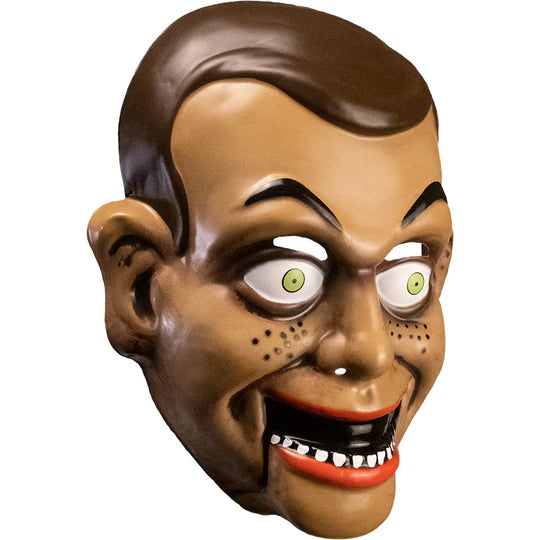 Goosebumps Night of the Living Dummy Slappy the Dummy Vacuform Costume Mask features a lightweight, vacuform mask with Slappy's instantly recognizable mischievous grin, arched eyebrows, sharp cheek contours, slicked brown hair, and bold painted details that recreate the vintage book-cover look of the infamous ventriloquist dummy, right side profile view