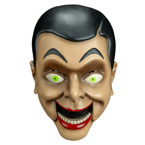 Goosebumps Night of the Living Dummy Slappy the Dummy Vinyl Costume Mask features a vinyl mask with three-dimensional sculpt, showcasing Slappy's unmistakable wide grin, arched eyebrows, sharp cheek lines, slicked-back brown hair, and bold painted details, front view