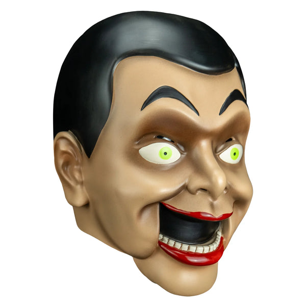 Goosebumps Night of the Living Dummy Slappy the Dummy Vinyl Costume Mask features a vinyl mask with three-dimensional sculpt, showcasing Slappy's unmistakable wide grin, arched eyebrows, sharp cheek lines, slicked-back brown hair, and bold painted details, right profile