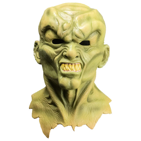 Goosebumps The Haunted Mask Costume Mask features a sickly yellow‑green latex finish, darker olive shading for an aged, cursed look, deep hollow black eye openings, exaggerated cheek contours, a stretched twisted smile with shadowed wrinkles, flared nostrils, and smooth rounded edges, front view