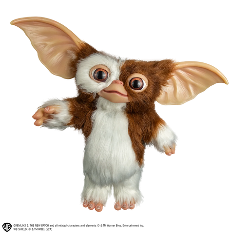 Gremlins Gizmo Mogwai Costume Prop Doll features a screen inspired doll with oversized, posable ears, foam body with posable wire skeleton frame, expressive, inserted eyes, soft facial features, fluffy, brown and cream toned texturing, and Gizmo's signature but sweet-but-mischievous look, front view