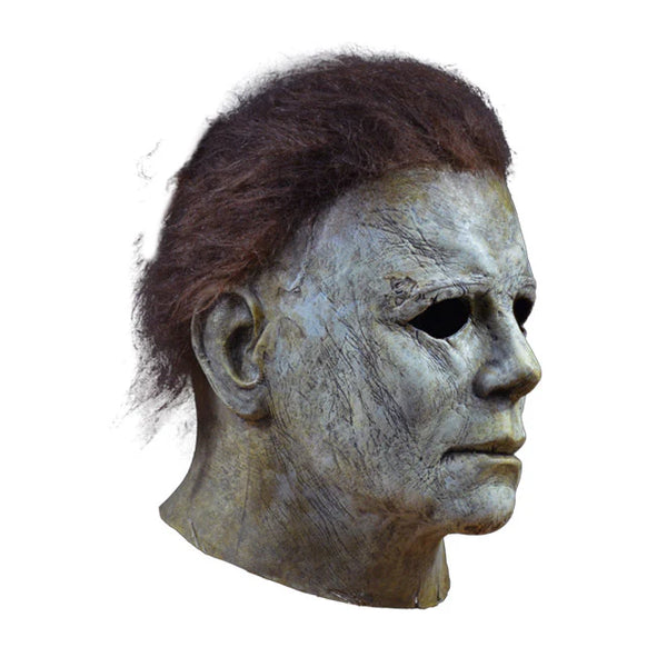 Halloween 2018 Movie Michael Myers Costume Mask features a screen accurate, latex, sculpt with aged, pale, lifeless finish, cut and weathered details, and rooted brown hair, right side profile