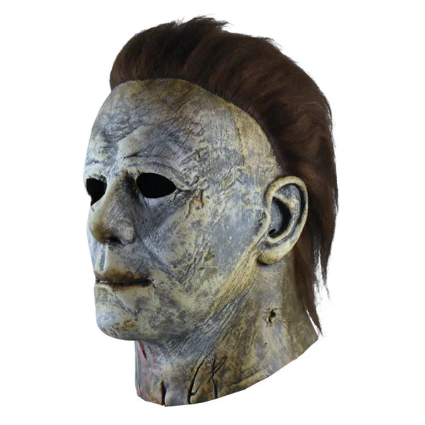 Halloween 2018 Movie Michael Myers Final Battle Bloody Edition Costume Mask Features a screen-accurate latex sculpt with cut and weathered facial features, realistic gash and blood, layered over a pale, deathly finish, and attached hair, left side profile