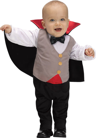 Toddler in the Infants Toddlers Baby Dracula Vampire Costume featuring a soft one‑piece outfit styled to resemble a classic vampire suit, designed with black pants and an attached white shirt front layered under a gray vest with gold button accents and a black bow tie. The costume includes a dramatic attached cape with a high stand‑up collar lined in bright red satin, creating that instantly recognizable Dracula silhouette while remaining lightweight and comfortable for little ones.