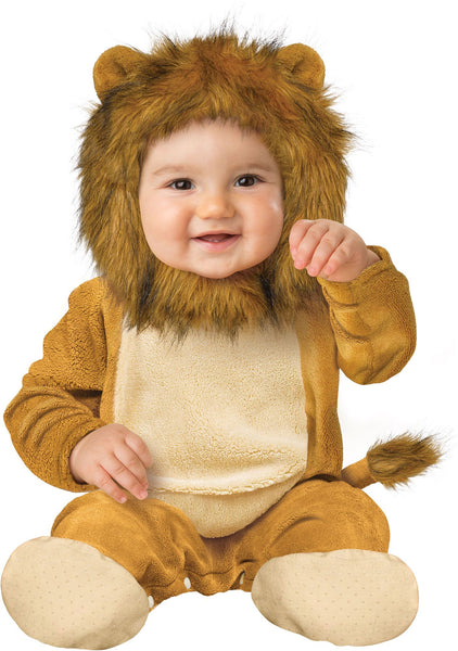 Baby wearing the Infants/Toddlers Cuddly Lion Costume featuring a soft plush one‑piece jumpsuit in warm golden‑brown tones with a lighter beige belly panel, designed in a cozy, full‑coverage silhouette; includes an attached hood with a fluffy faux‑fur lion’s mane and rounded ears, along with a matching tail tipped with faux fur at the back to complete the classic lion look; also designed with snap close inseam for easy changing