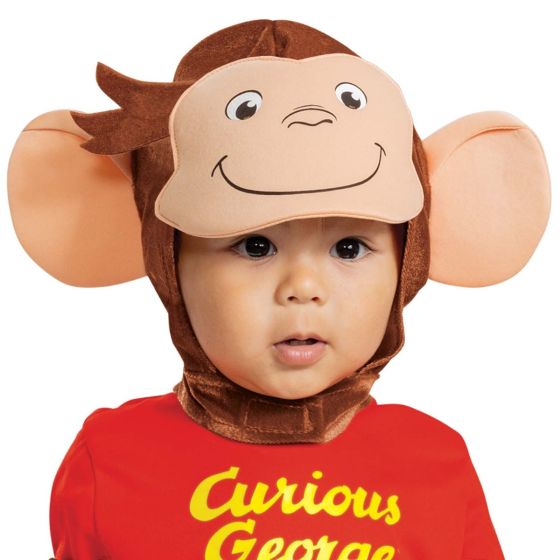 Close up of the Infants Toddlers Curious George Costume featuring a soft one‑piece jumpsuit designed in warm brown tones with an attached red shirt front printed with the “Curious George” logo in bright yellow lettering. The jumpsuit has long sleeves and full‑length pants for a cozy, comfortable fit. It is paired with a character headpiece designed with George’s signature smiling face and oversized rounded ears