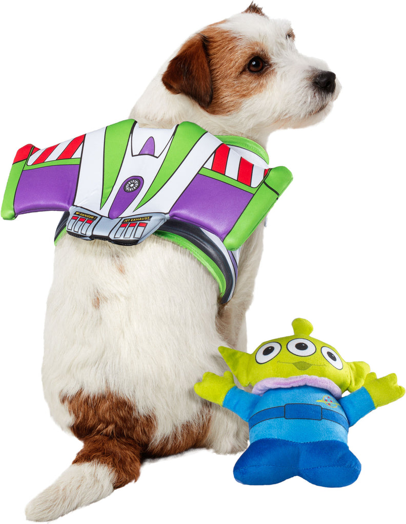 Jack Russel in Pets Disney Pixar Toy Story Buzz Lightyear Costume and Toy Kit featuring  Buzz Lightyear’s iconic space ranger suit, styled with bold panels of white, green, purple, and red printed armor detailing across a wing‑shaped structure that sits neatly along the pet’s back; includes a coordinating plush green alien toy with three eyes, pointed ears, and a blue outfit printed with the Pizza Planet logo, completing the playful Toy Story pairing