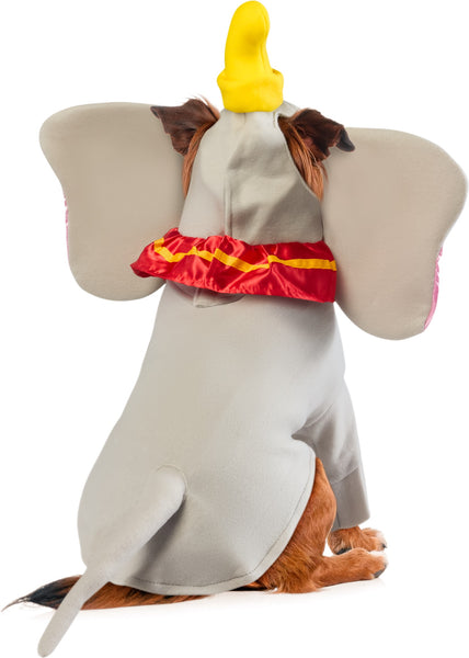 Jack Russel in Pets Dumbo costume featuring a soft gray full‑body outfit designed to resemble Dumbo, with a smooth elephant‑inspired silhouette and fitted leg openings for a clean, cozy look; includes a large attached headpiece with oversized satin‑finish ears lined in light pink, creating the character’s signature wide‑ear profile and attached with a bright red ruffled collar trimmed in yellow around the neckline and topped with a yellow circus hat featuring a small Dumbo graphic, while a gray padded tail