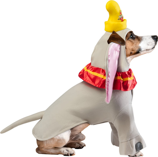 Jack Russel in Pets Dumbo costume featuring a soft gray full‑body outfit designed to resemble Dumbo, with a smooth elephant‑inspired silhouette and fitted leg openings for a clean, cozy look; includes a large attached headpiece with oversized satin‑finish ears lined in light pink, creating the character’s signature wide‑ear profile and attached with a bright red ruffled collar trimmed in yellow around the neckline and topped with a yellow circus hat featuring a small Dumbo graphic, while a gray padded tail