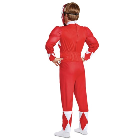 Child posing in Kids Mighty Morphin Power Rangers Red Ranger Muscle Costume featuring a full‑body red jumpsuit designed with built‑in padded muscle detailing across the chest, arms, and torso for a strong, hero‑ready silhouette. The suit is styled with the iconic white diamond chest pattern, matching diamond accents at the wrists and calves, and an attached belt graphic with a detailed Power Rangers emblem at the center. The costume includes a molded Red Ranger helmet mask w/ a glossy finish and black visor