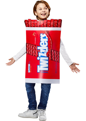 Boy in the Kids Twizzlers Candy Costume Featuring a foam-backed tunic costume designed to resemble a Twizzlers candy package, with a bold red wrapper print, large white Twizzlers logo across the front, printed strawberry flavor text, realistic red licorice twists detailing at the top, jagged wrapper-style edges, and a sleeveless pull-on design with side ties for a secure and adjustable fit over everyday clothing.