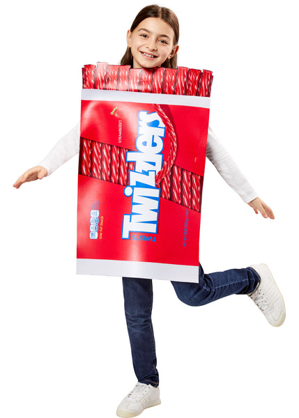Girl posing in the Kids Twizzlers Candy Costume Featuring a foam-backed tunic costume designed to resemble a Twizzlers candy package, with a bold red wrapper print, large white Twizzlers logo across the front, printed strawberry flavor text, realistic red licorice twists detailing at the top, jagged wrapper-style edges, and a sleeveless pull-on design with side ties for a secure and adjustable fit over everyday clothing.