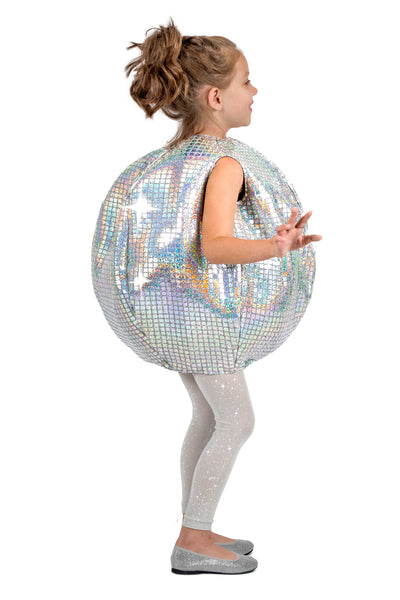 Girl posing in Kids Grooving Disco Ball Costume Features a shiny silver spherical tunic styled to look like a classic mirrored disco ball, covered in reflective square panel detailing that catches the light from every angle and matching leggings, side view