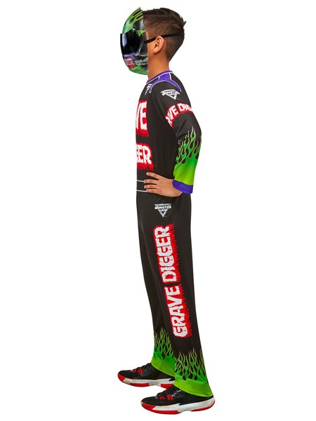 Side view of a boy wearing a black racing suit for Monster Jam's Grave Digger