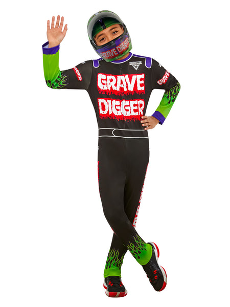 Boy waving in Grave Digger costume