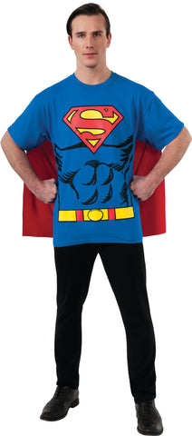 Man in DC Universe Superman Costume Shirt with Cape featuring a comfortable blue short‑sleeve T‑shirt printed with a bold comic‑style Superman design including the iconic red‑and‑yellow “S” shield emblem prominently displayed on the chest, along with printed muscle shading and a bright yellow utility belt graphic across the waist; includes an attached red cape that drapes down the back and features a large Superman emblem printed between the shoulders for a fully recognizable hero silhouette from both front