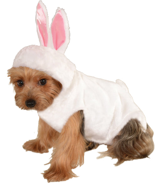 Yorkie wearing the Pets Bunny Rabbit Costume featuring a soft white plush one‑piece outfit that covers the body with a rounded, cozy silhouette; includes an attached hood trimmed in white faux fur and topped with tall upright bunny ears lined in light pink, along with a small, rounded bunny tail 