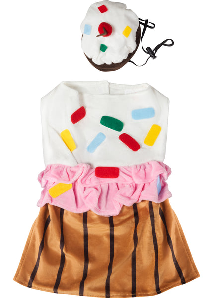 Pets Cute Cupcake Costume featuring a sweet, dessert‑inspired two‑piece outfit with a soft plush body designed to resemble a cupcake base in rich golden‑brown tones with vertical liner striping; topped with a layered “frosting” section made from fluffy white and pink fabric, decorated with colorful sprinkle accents in red, yellow, blue, and green. The look is completed with a matching cupcake headpiece topped with a red pom‑pom cherry detail, adding the perfect finishing touch